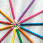 coloured-pencils-arranged-in-a-circle-on-a-wooden-2021-10-21-02-32-14-utc